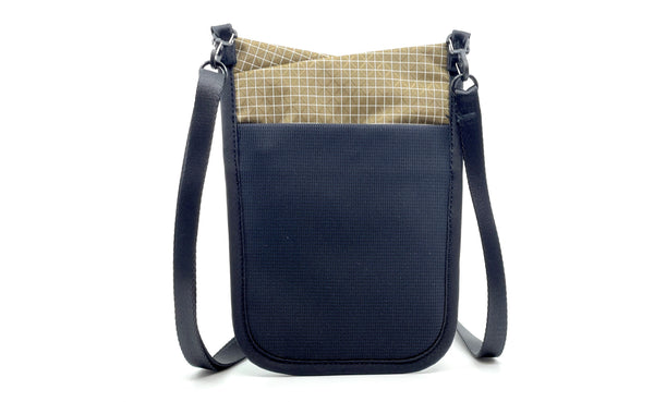 The rear of the P.I.K.A. Pouch in Coyot (tan with white gridding) 200 Halcyon.